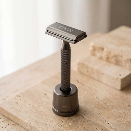 CRAN. razor resting in its matching stand